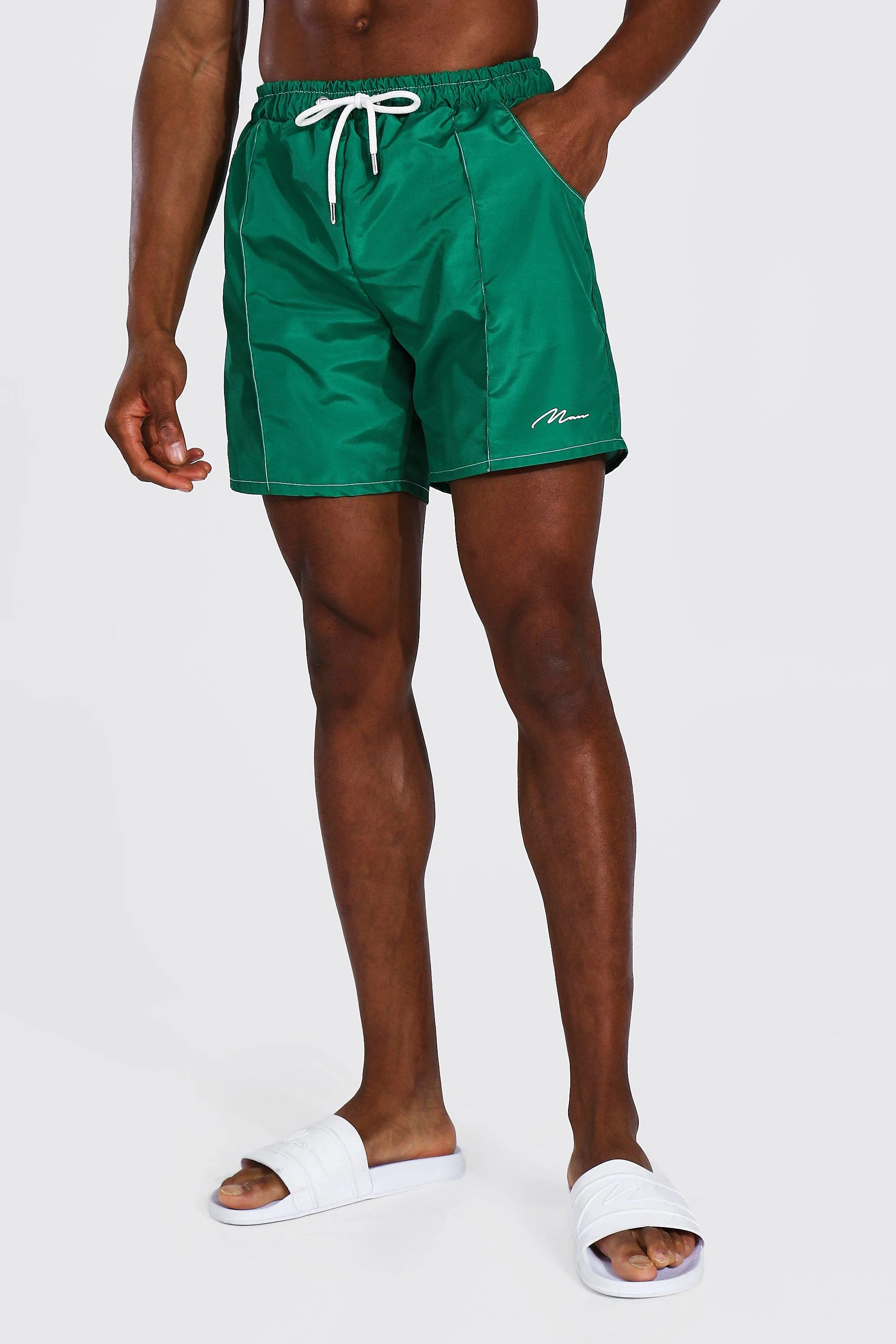 Man Signature Pin Tuck Mid Length Swim Short | boohooMAN UK