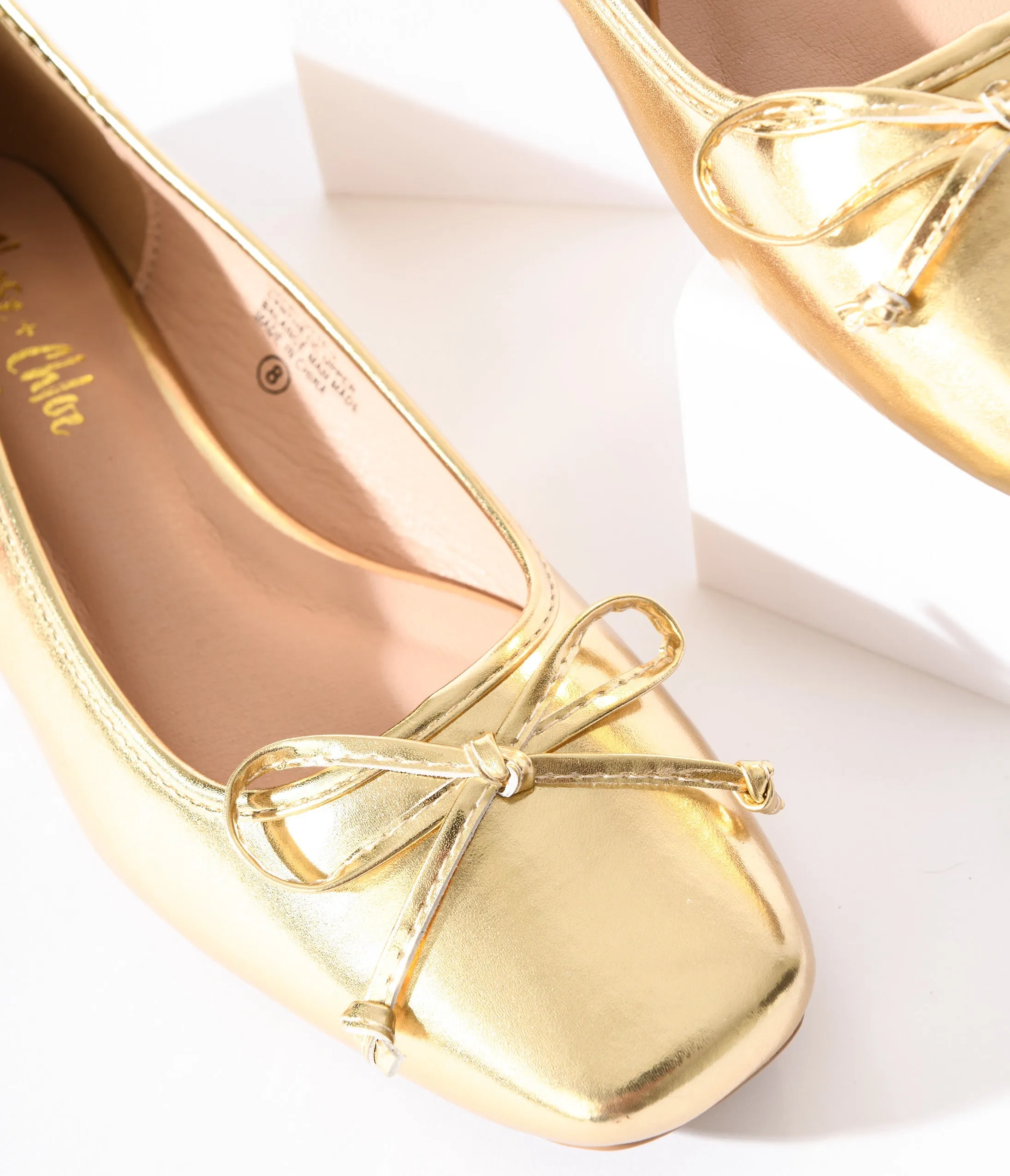 Metallic Gold Leatherette Bow Flats